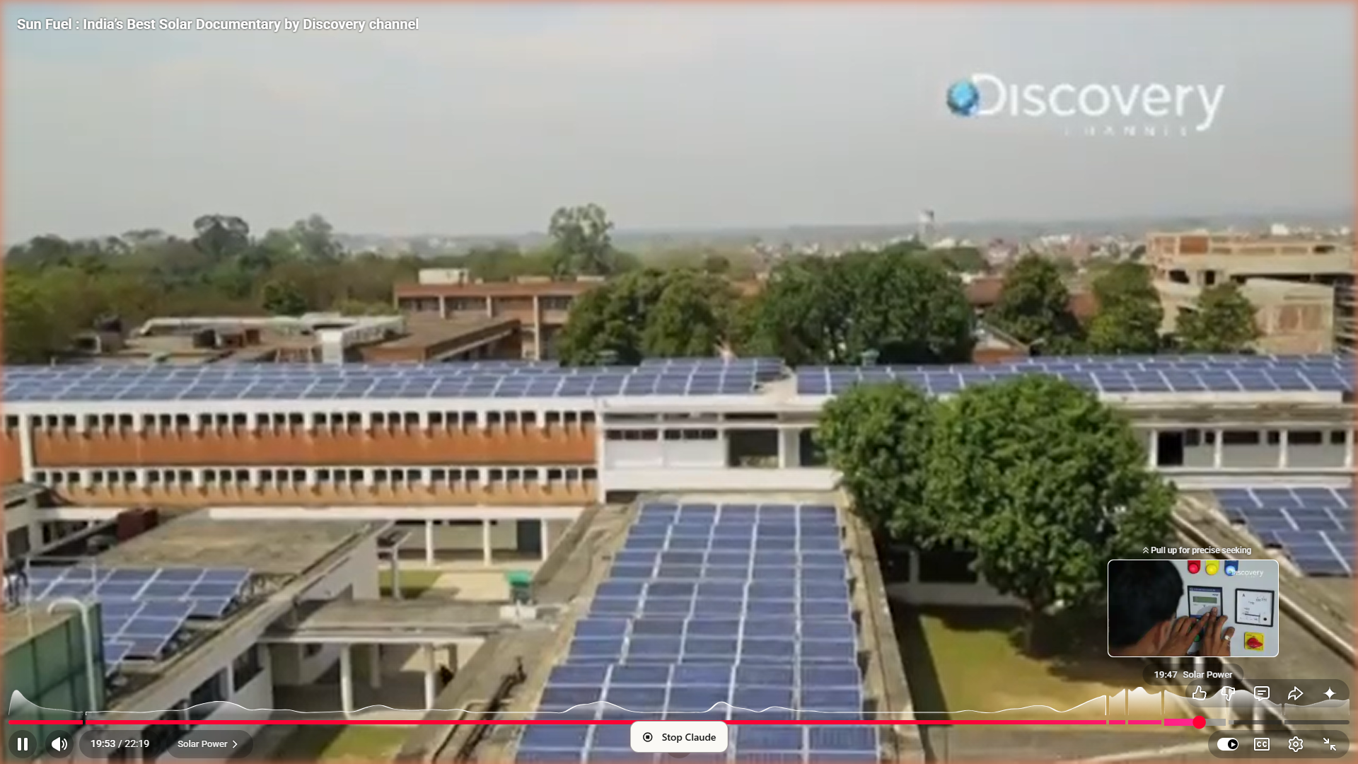Kunwer Sachdev standing on the rooftop of Punjab Engineering College Chandigarh with 1MW solar installation