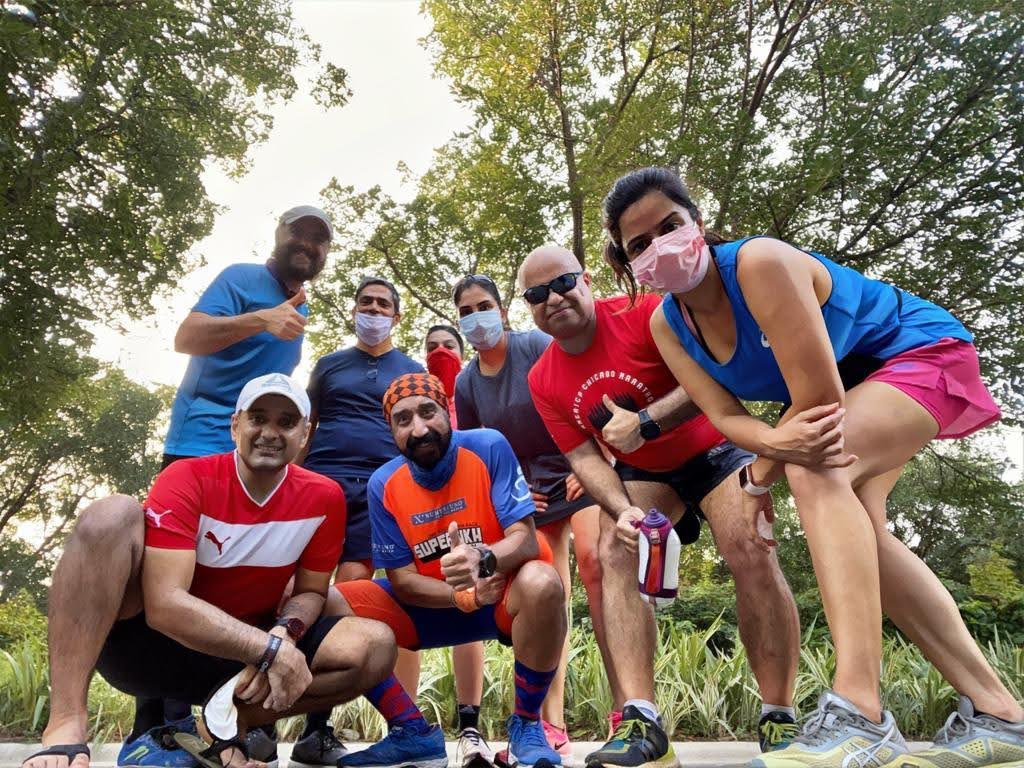 Kunwer Sachdev with a running group in a park, still running today