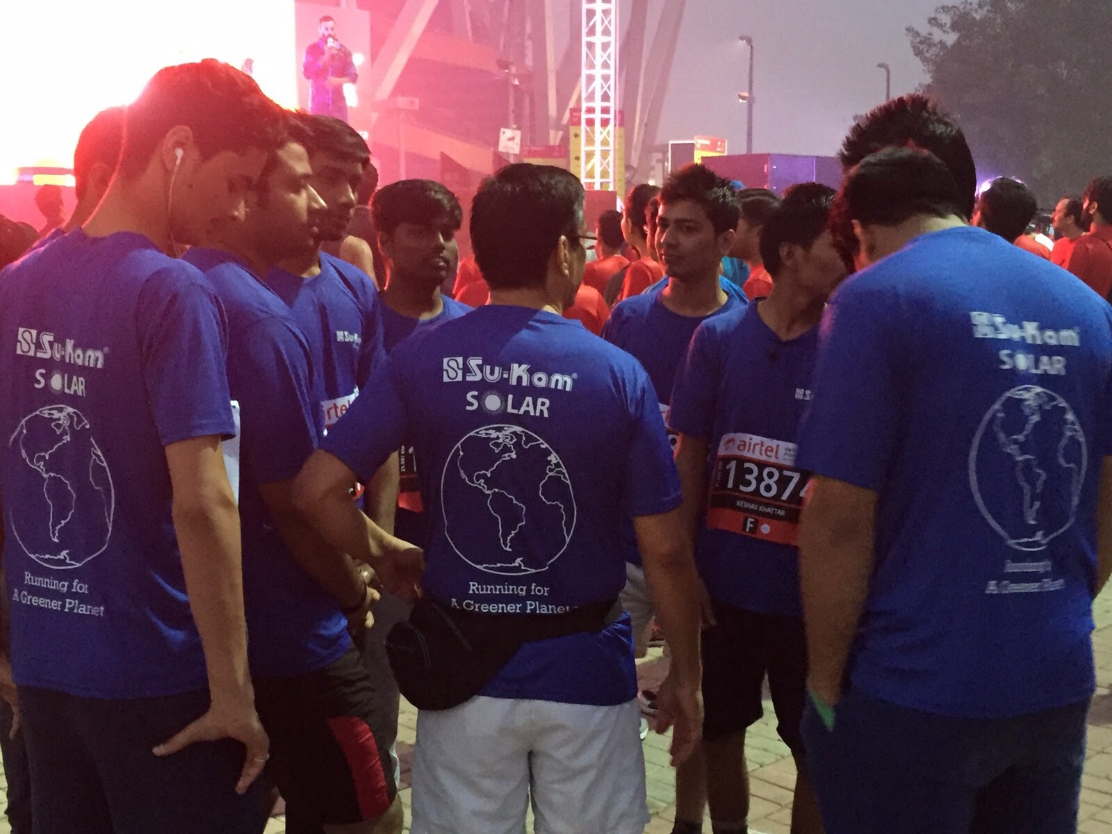 Team Su-Kam Solar jerseys reading Running for a Greener Planet