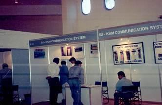 Su-Kam Communication System exhibition stand with visitors