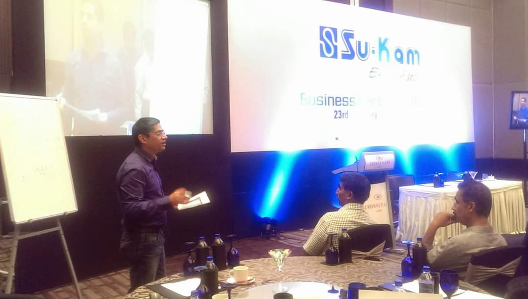 Kunwer Sachdev on stage as a speaker at TiE / industry conference — the flag-bearer of Indian electronics.