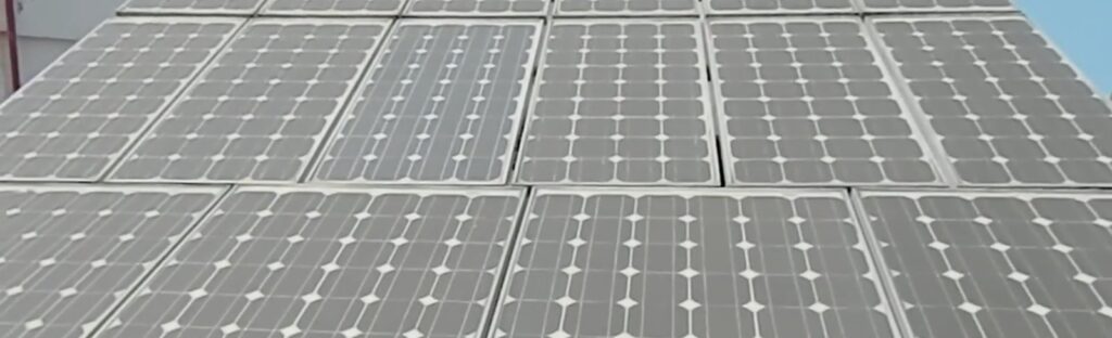 2.4 kW rooftop solar panel array on the terrace of the Su-Kam R&D building feeding the DC system