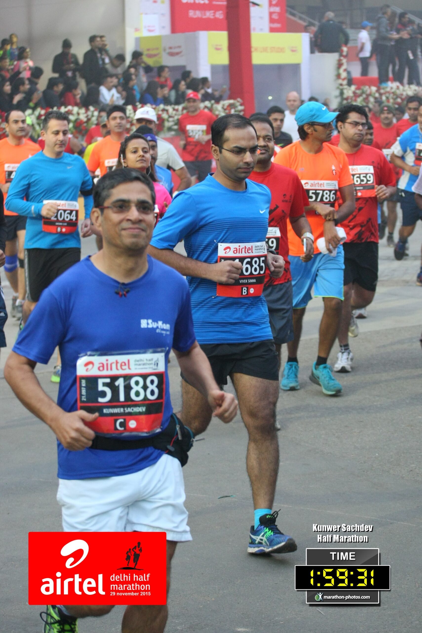 Kunwer Sachdev running the Airtel Delhi Half Marathon, bib 5188, finish time 1:59:31