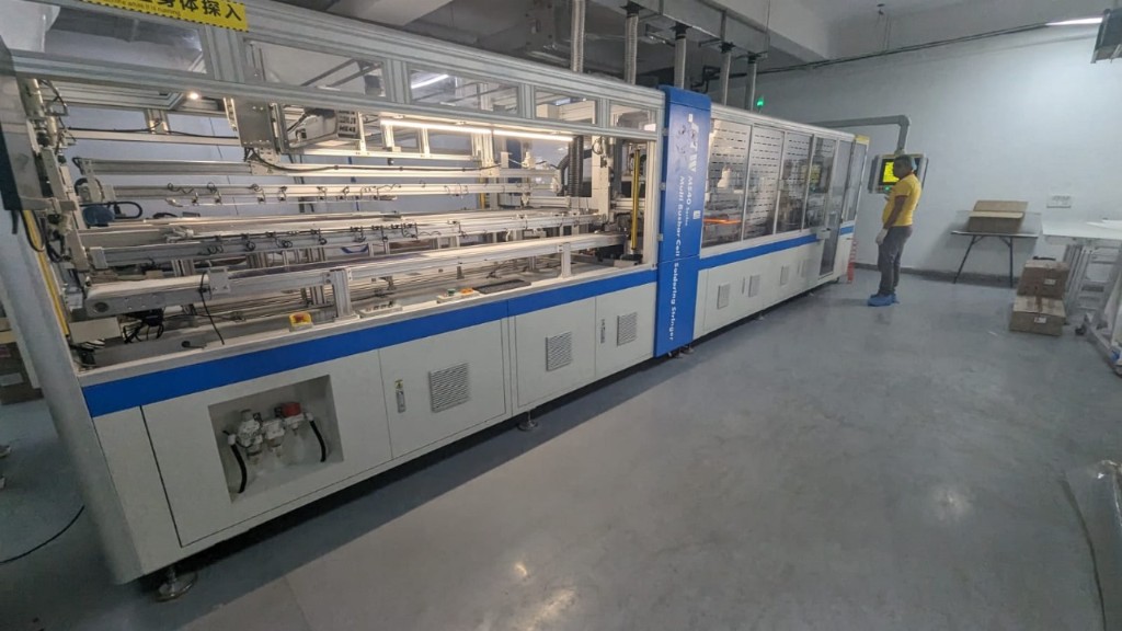 Imported MS40 Multi Busbar Cell Soldering Stringer with Chinese safety labeling in a solar assembly plant