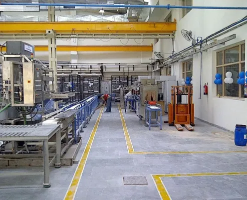 Modern manufacturing innovation floor representing rebuilding through Su-Vastika and Kunwwer.ai