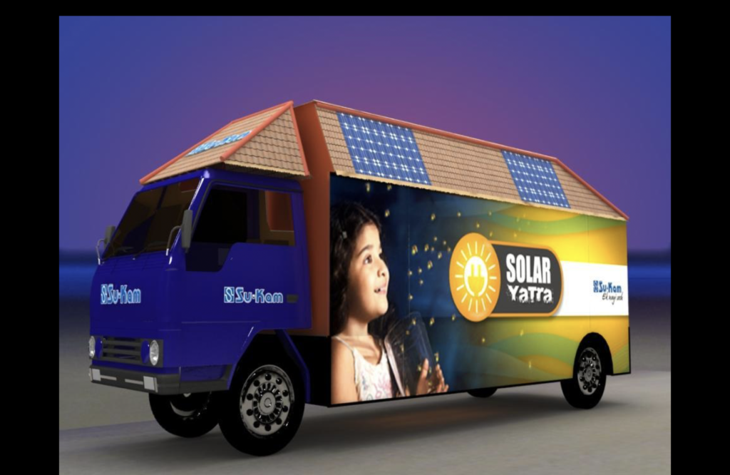 Su-Kam Solar Yatra demonstration truck with rooftop solar panels — mobile solar awareness vehicle
