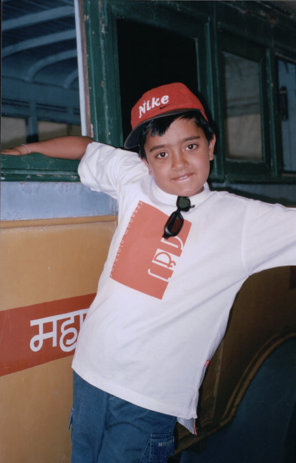 Young Shourrya leaning against a bus window