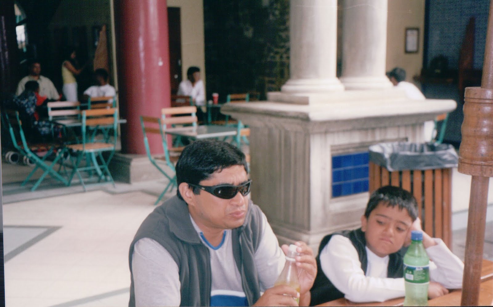 Kunwer Sachdev and young Shourrya at an outdoor cafe