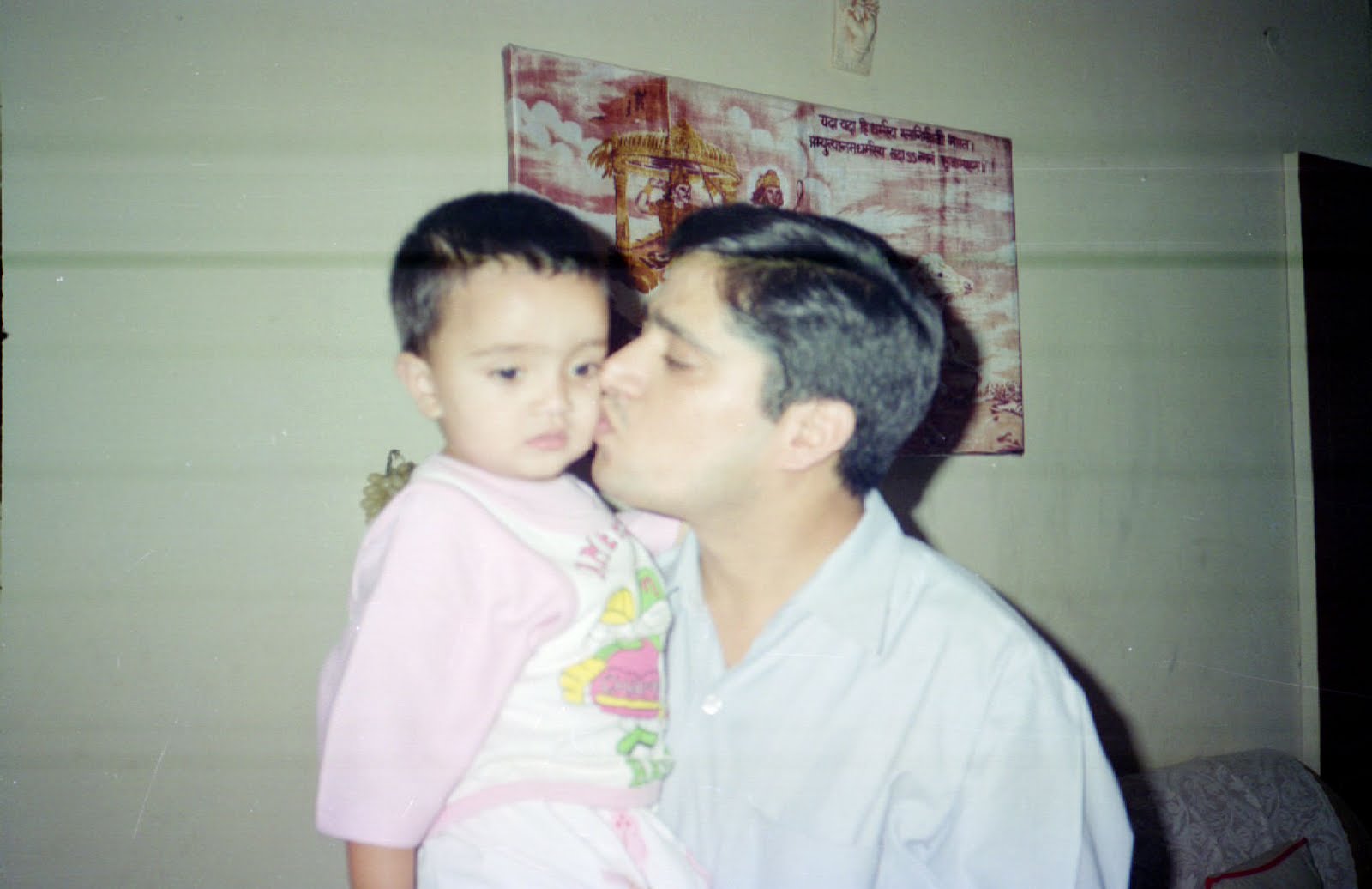 Kunwer Sachdev kissing young Shourrya on the cheek