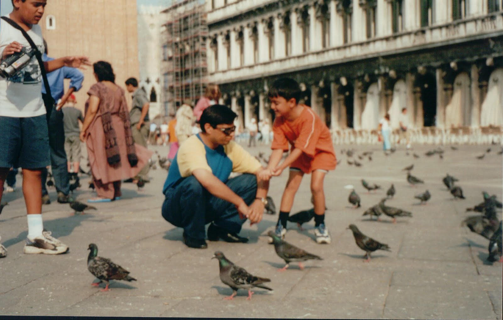 Kunwer Sachdev and young Shourrya feeding pigeons in Venice