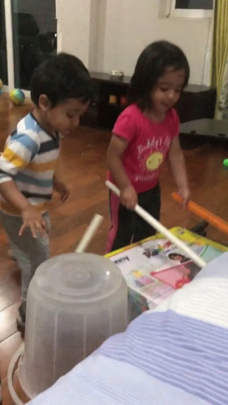 Children inventing play from scrap and cardboard—jugaad and tinkering as talent signals
